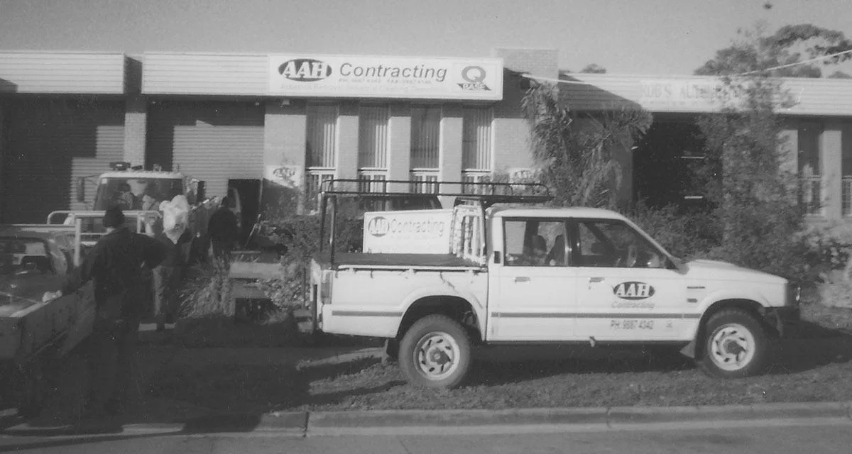 AAH Contracting crew and trucks in the 1990s