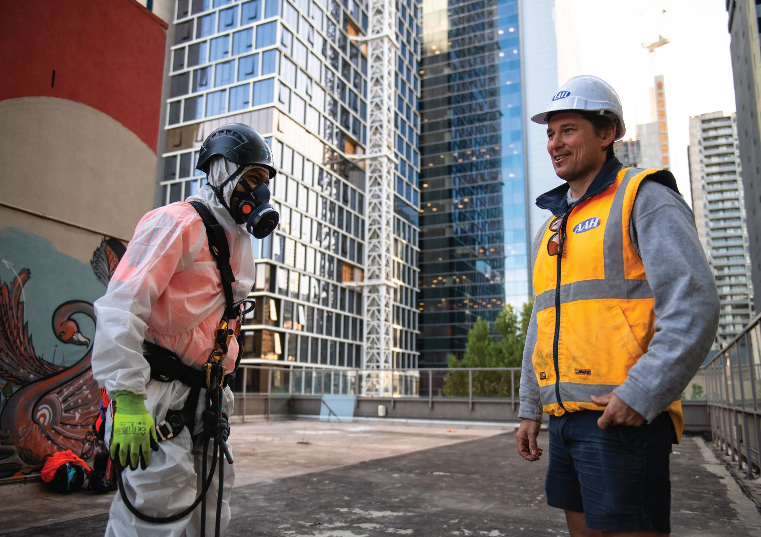 Two AAH team members talking on site